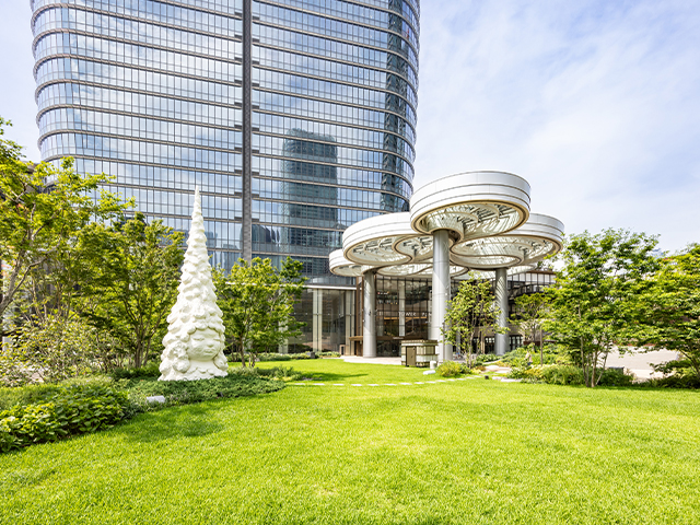 The approx. 6,000m² large Central Green with lush greenery (rendition)